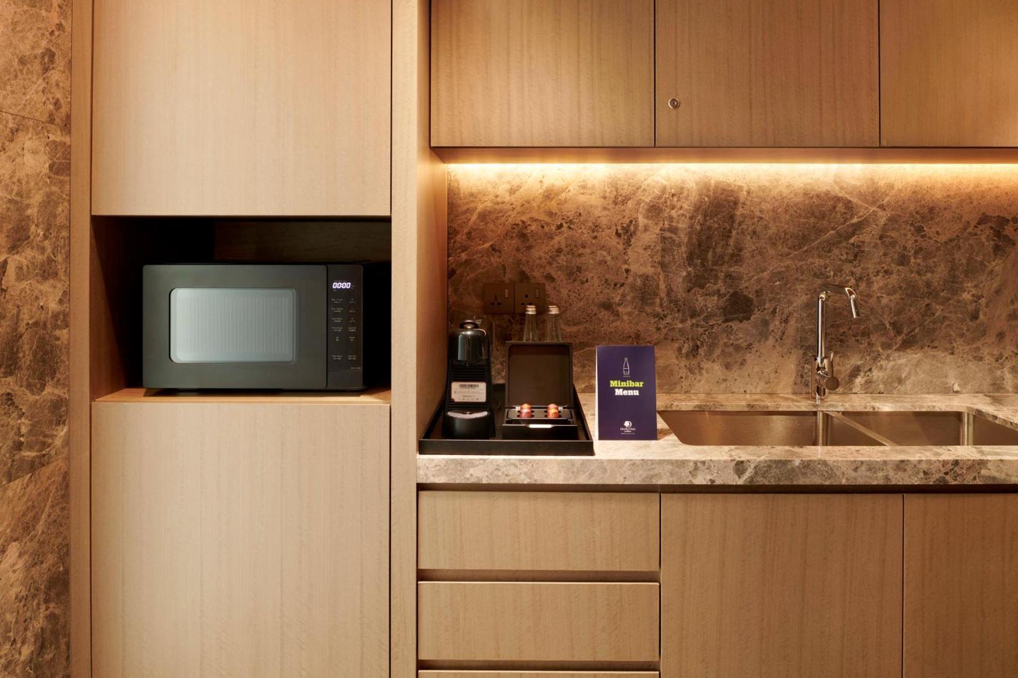 Doubletree By Hilton Shah Alam I-City Екстериор снимка A microwave oven in a kitchen